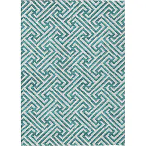 Photo of Teal Blue And Ivory Geometric Washable Indoor Outdoor Area Rug