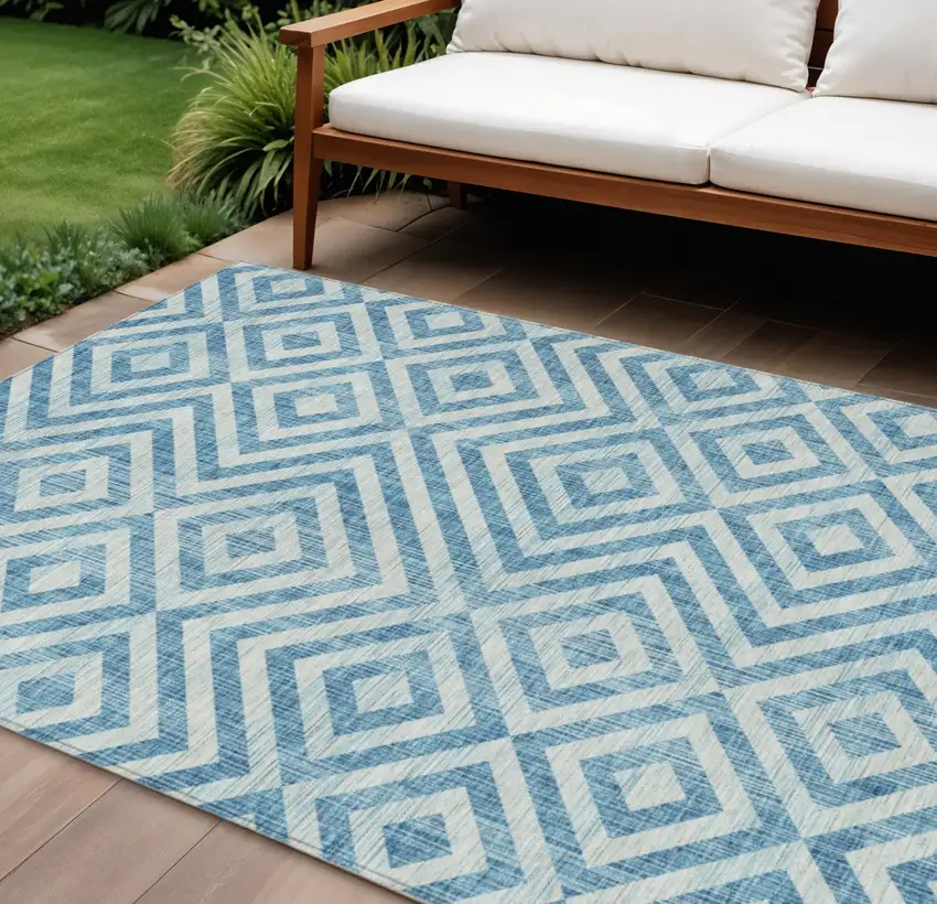 Teal Blue And Ivory Geometric Washable Indoor Outdoor Area Rug Photo 1