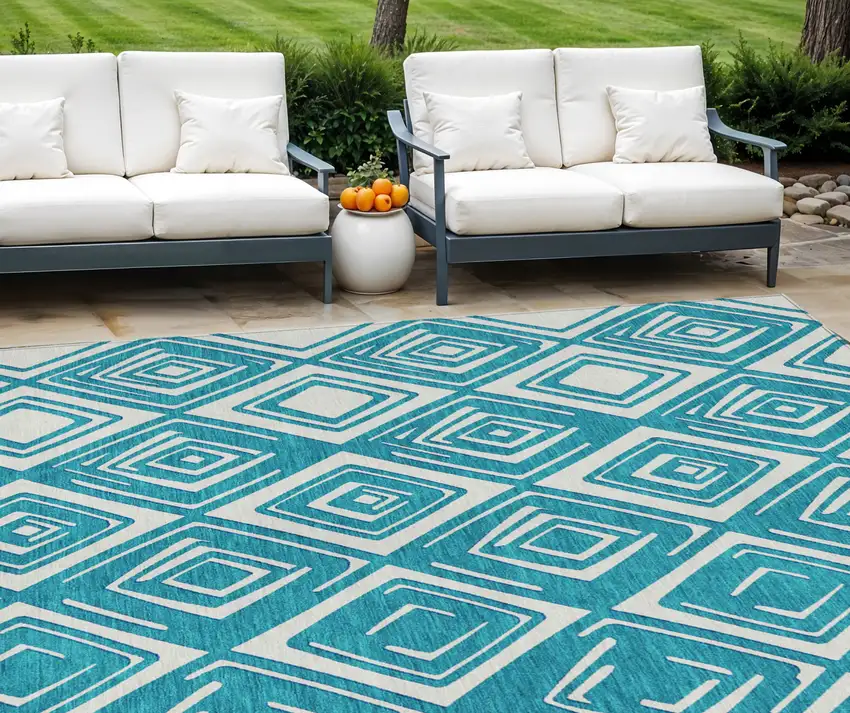 Teal Blue And Ivory Geometric Washable Indoor Outdoor Area Rug Photo 1