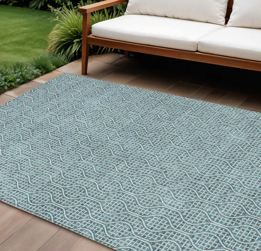 Teal Blue And Ivory Geometric Washable Indoor Outdoor Area Rug Photo 1