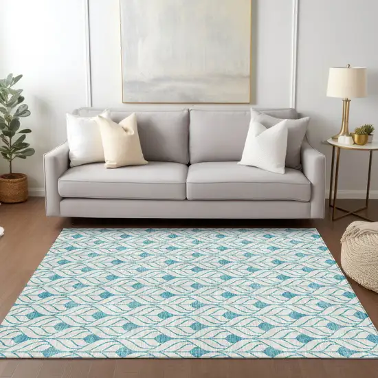 Teal Blue And Ivory Geometric Washable Indoor Outdoor Area Rug Photo 9