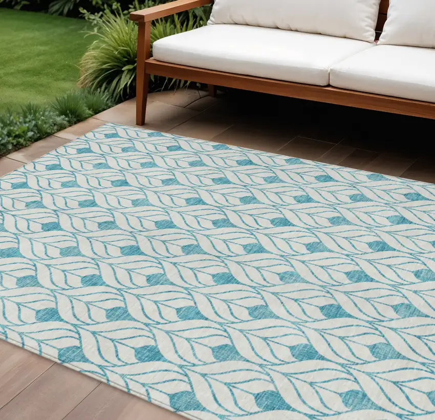 Teal Blue And Ivory Geometric Washable Indoor Outdoor Area Rug Photo 1