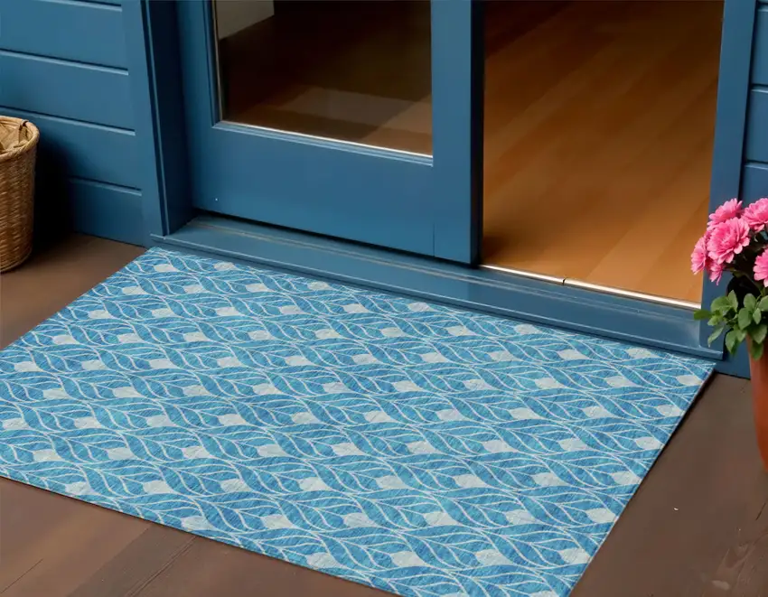 Teal Blue And Ivory Geometric Washable Indoor Outdoor Area Rug Photo 1