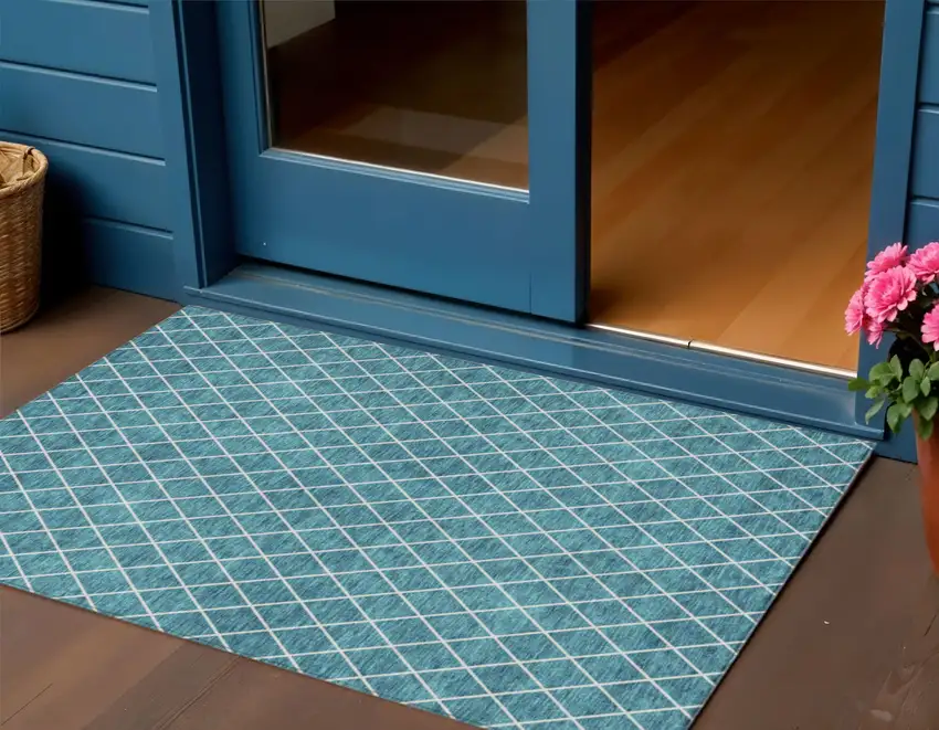 Teal Blue And Ivory Geometric Washable Indoor Outdoor Area Rug Photo 1