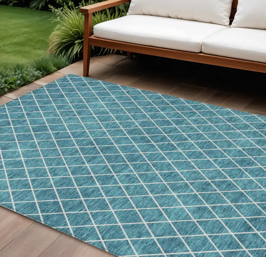 Teal Blue And Ivory Geometric Washable Indoor Outdoor Area Rug Photo 1