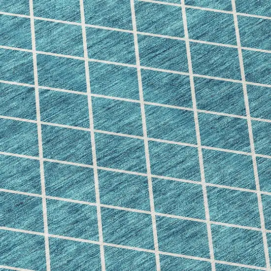 Teal Blue And Ivory Geometric Washable Indoor Outdoor Area Rug Photo 5