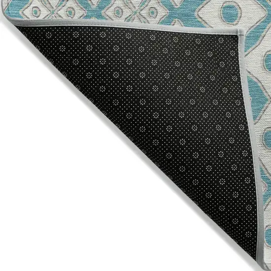 Teal Blue And Ivory Geometric Washable Indoor Outdoor Area Rug Photo 4