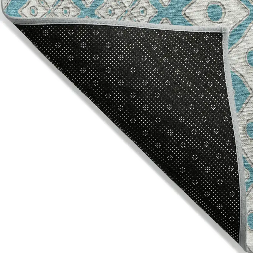 Teal Blue And Ivory Geometric Washable Indoor Outdoor Area Rug Photo 4