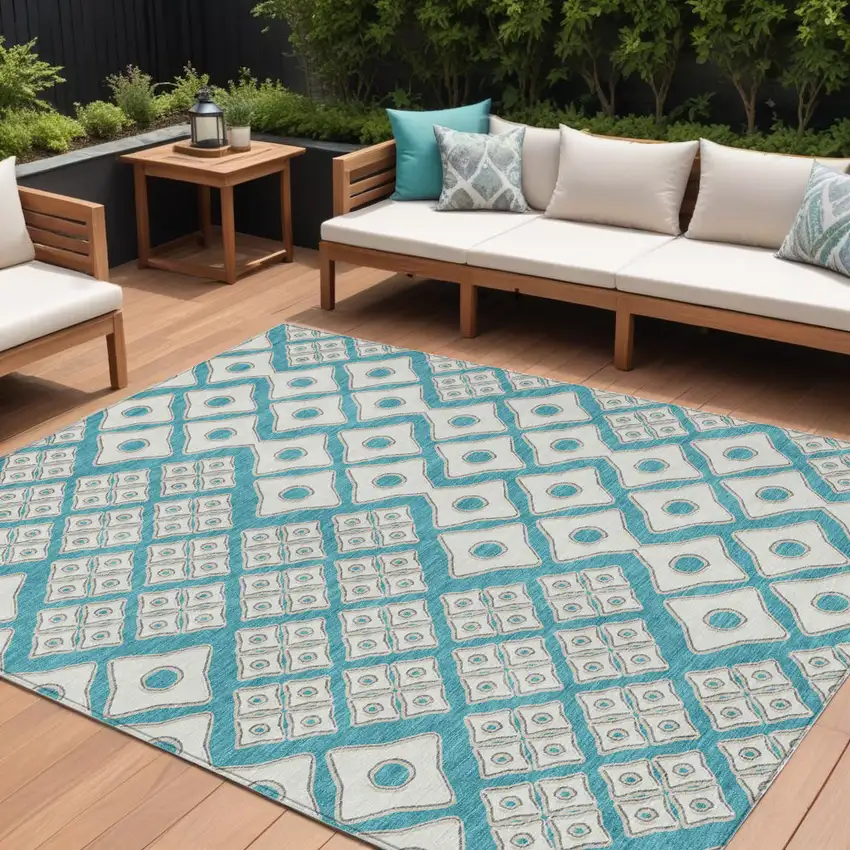 Teal Blue And Ivory Geometric Washable Indoor Outdoor Area Rug Photo 1