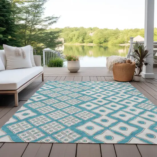 Teal Blue And Ivory Geometric Washable Indoor Outdoor Area Rug Photo 9