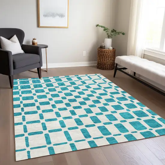 Teal Blue And Ivory Geometric Washable Indoor Outdoor Area Rug Photo 9