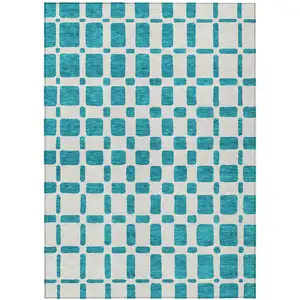 Photo of Teal Blue And Ivory Geometric Washable Indoor Outdoor Area Rug