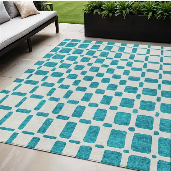 Teal Blue And Ivory Geometric Washable Indoor Outdoor Area Rug Photo 1
