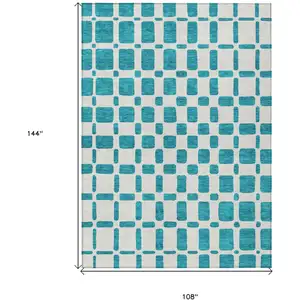 Photo of Teal Blue And Ivory Geometric Washable Indoor Outdoor Area Rug