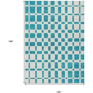 Photo of Teal Blue And Ivory Geometric Washable Indoor Outdoor Area Rug