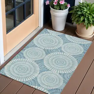 Photo of Teal Blue And Ivory Geometric Washable Indoor Outdoor Area Rug