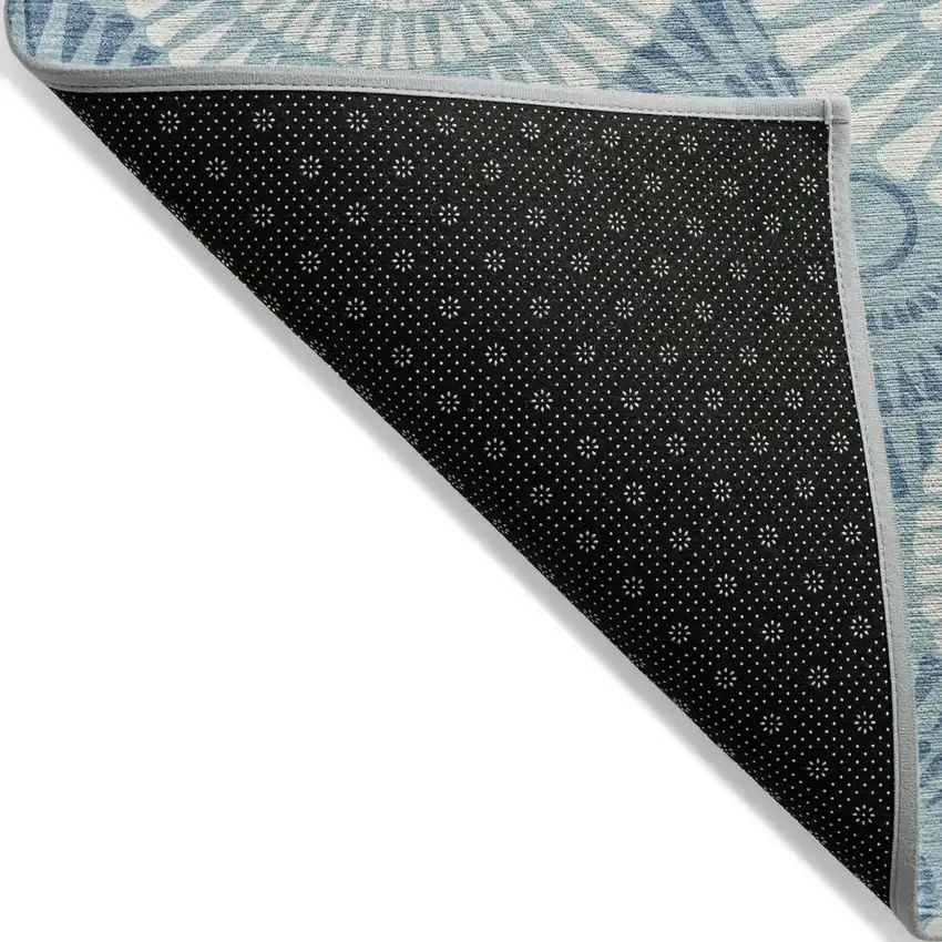 Teal Blue And Ivory Geometric Washable Indoor Outdoor Area Rug Photo 4
