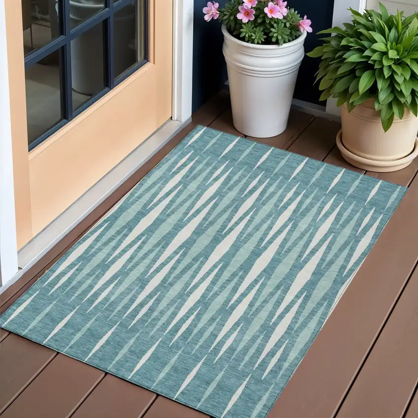 Teal Blue And Ivory Geometric Washable Indoor Outdoor Area Rug Photo 1