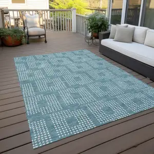 Photo of Teal Blue And Ivory Geometric Washable Indoor Outdoor Area Rug