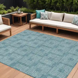 Photo of Teal Blue And Ivory Geometric Washable Indoor Outdoor Area Rug