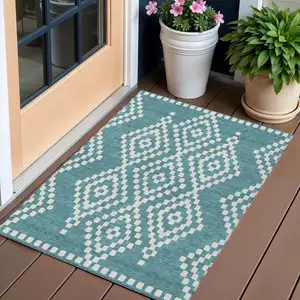 Photo of Teal Blue And Ivory Geometric Washable Indoor Outdoor Area Rug
