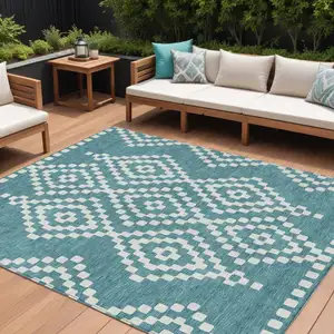 Photo of Teal Blue And Ivory Geometric Washable Indoor Outdoor Area Rug