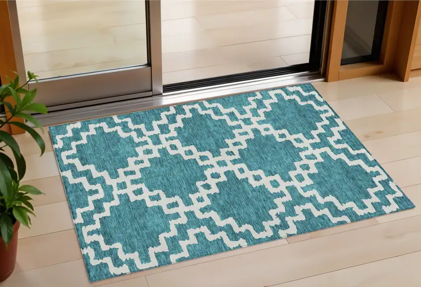 Teal Blue And Ivory Geometric Washable Indoor Outdoor Area Rug Photo 1