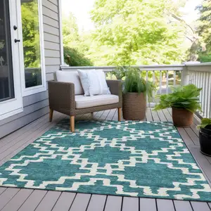 Photo of Teal Blue And Ivory Geometric Washable Indoor Outdoor Area Rug
