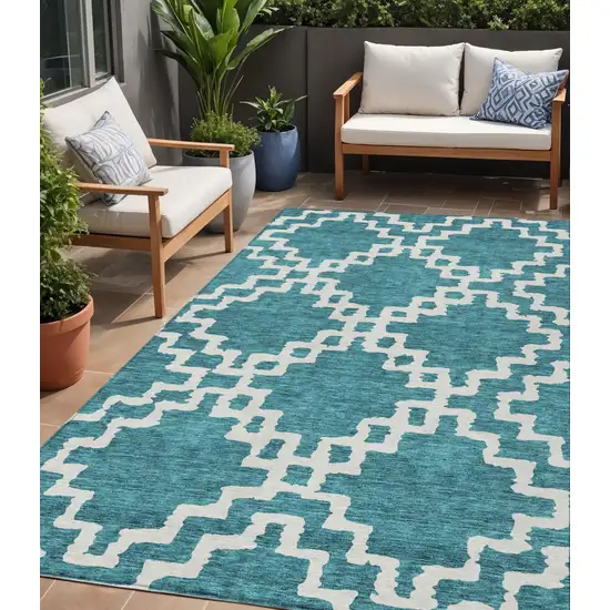 Teal Blue And Ivory Geometric Washable Indoor Outdoor Area Rug Photo 1