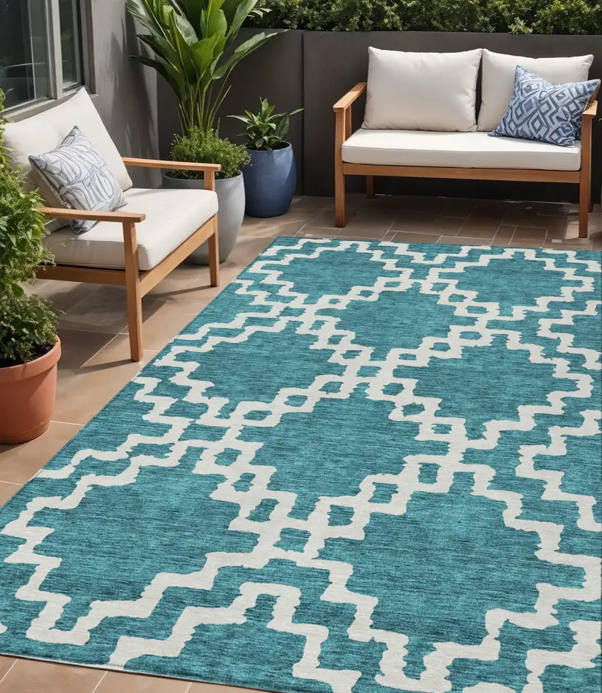 Teal Blue And Ivory Geometric Washable Indoor Outdoor Area Rug Photo 1