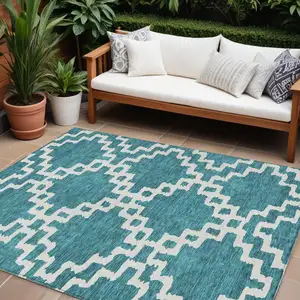 Photo of Teal Blue And Ivory Geometric Washable Indoor Outdoor Area Rug