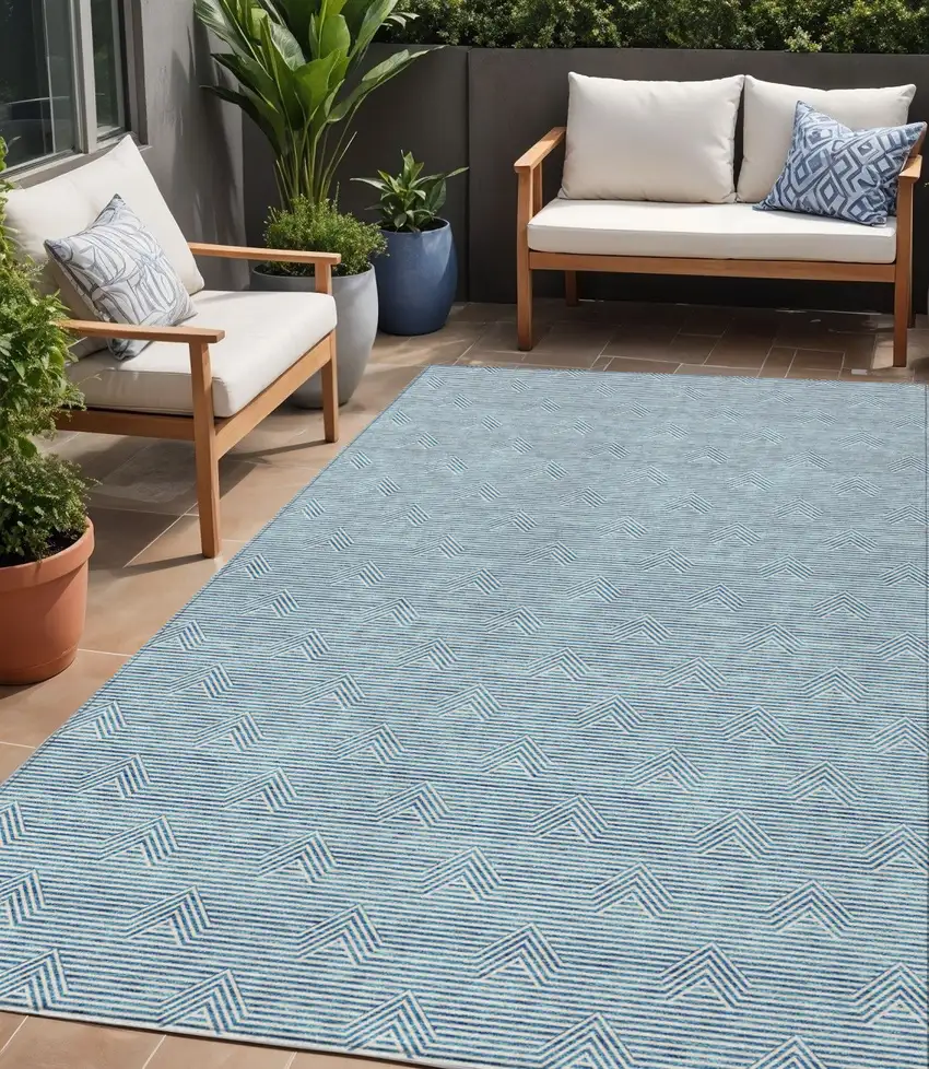 Teal Blue And Ivory Geometric Washable Indoor Outdoor Area Rug Photo 1