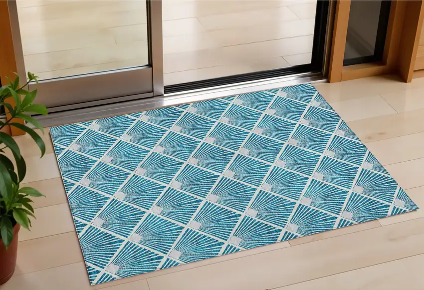 Teal Blue And Ivory Geometric Washable Indoor Outdoor Area Rug Photo 1