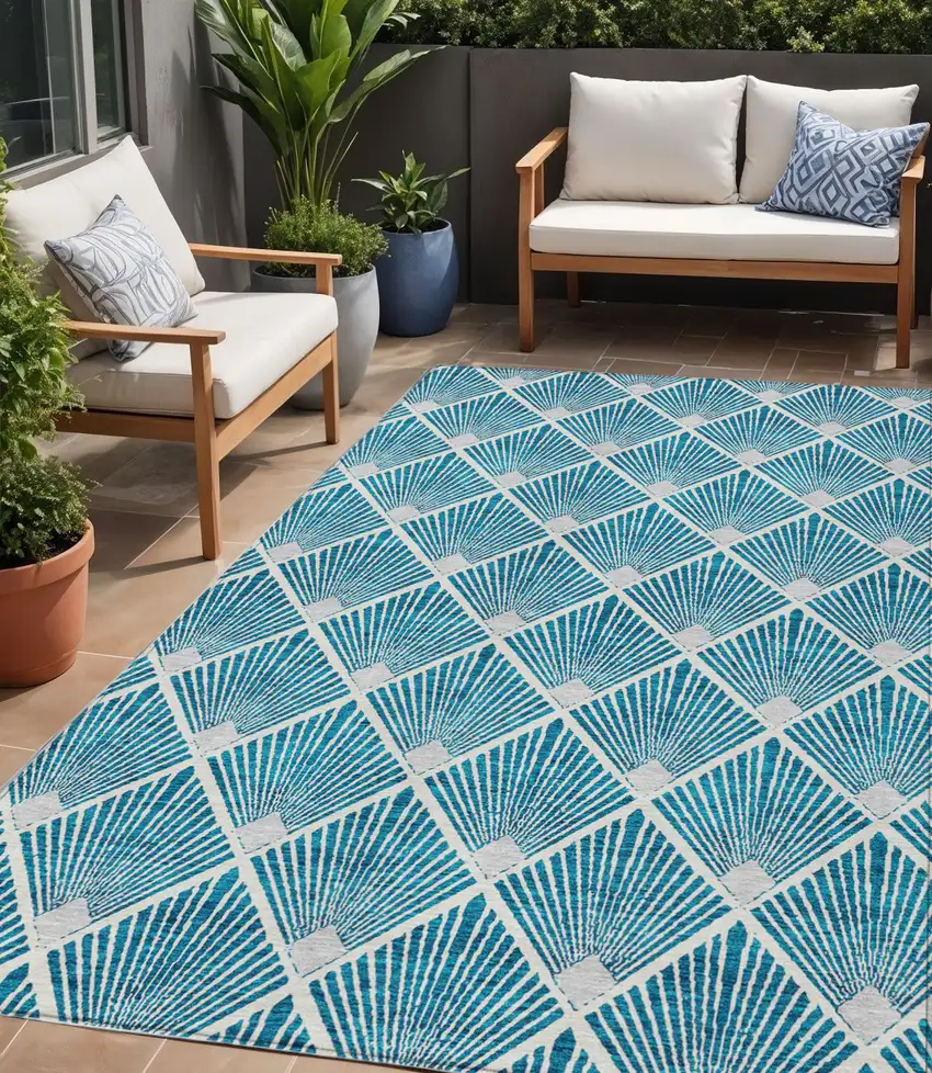 Teal Blue And Ivory Geometric Washable Indoor Outdoor Area Rug Photo 1