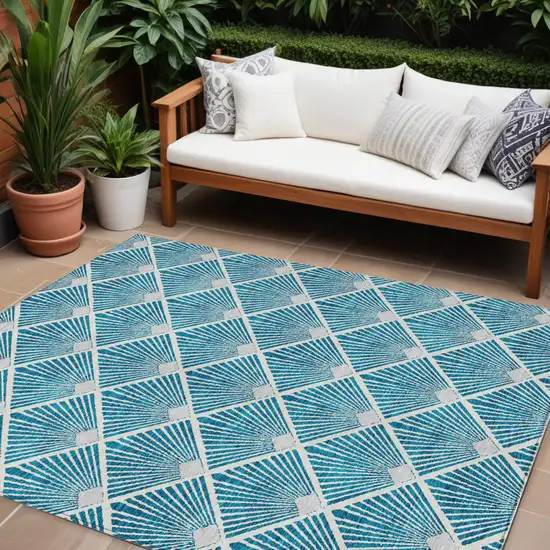 Teal Blue And Ivory Geometric Washable Indoor Outdoor Area Rug Photo 1