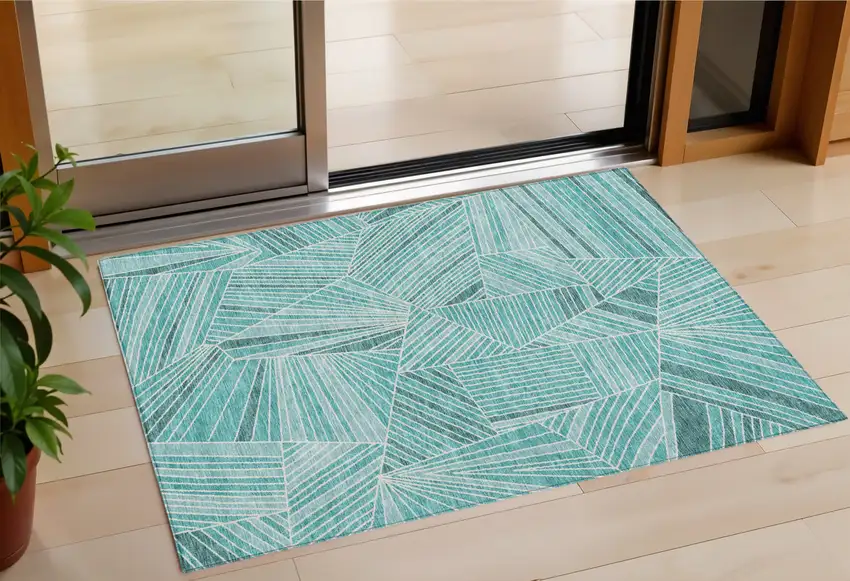 Teal Blue And Ivory Geometric Washable Indoor Outdoor Area Rug Photo 1