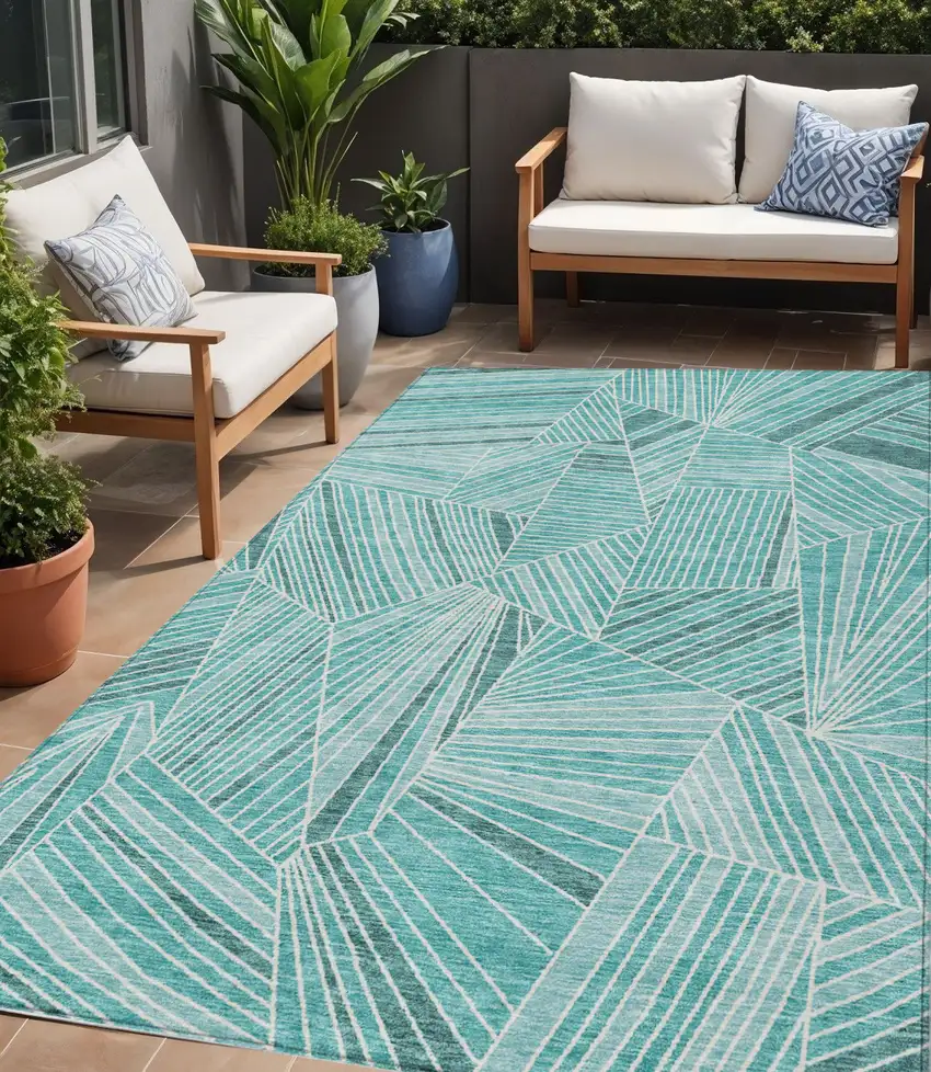 Teal Blue And Ivory Geometric Washable Indoor Outdoor Area Rug Photo 1
