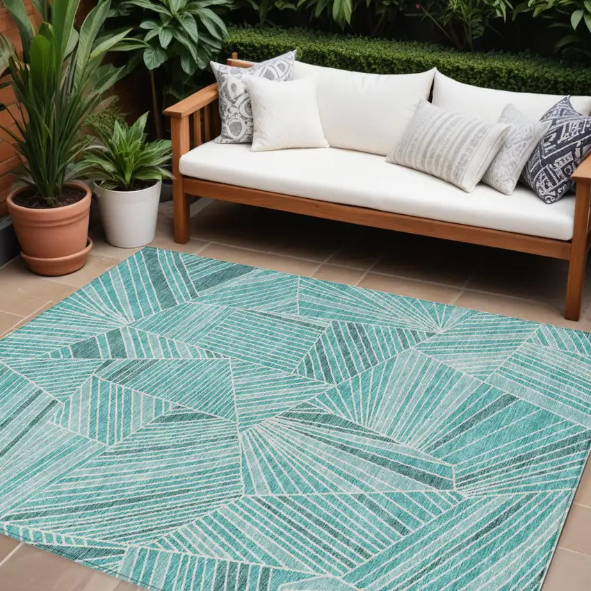Teal Blue And Ivory Geometric Washable Indoor Outdoor Area Rug Photo 1