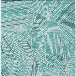 Photo of Teal Blue And Ivory Geometric Washable Indoor Outdoor Area Rug