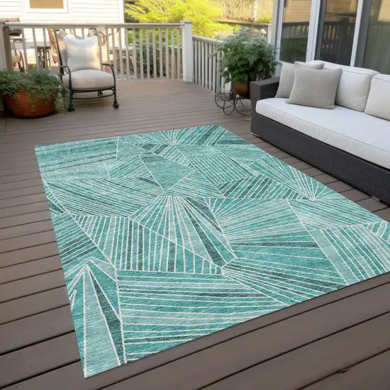 Teal Blue And Ivory Geometric Washable Indoor Outdoor Area Rug Photo 9
