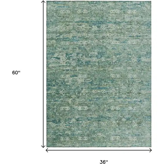 Teal Blue And Ivory Ikat Washable Indoor Outdoor Area Rug Photo 3