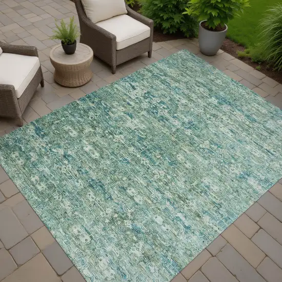 Teal Blue And Ivory Ikat Washable Indoor Outdoor Area Rug Photo 7