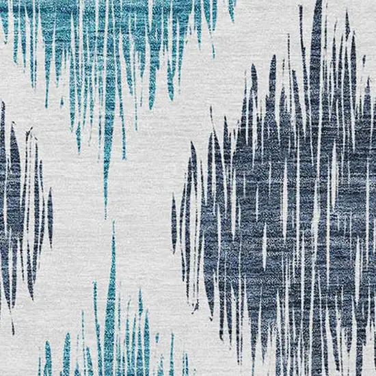 Teal Blue And Ivory Ikat Washable Indoor Outdoor Area Rug Photo 6