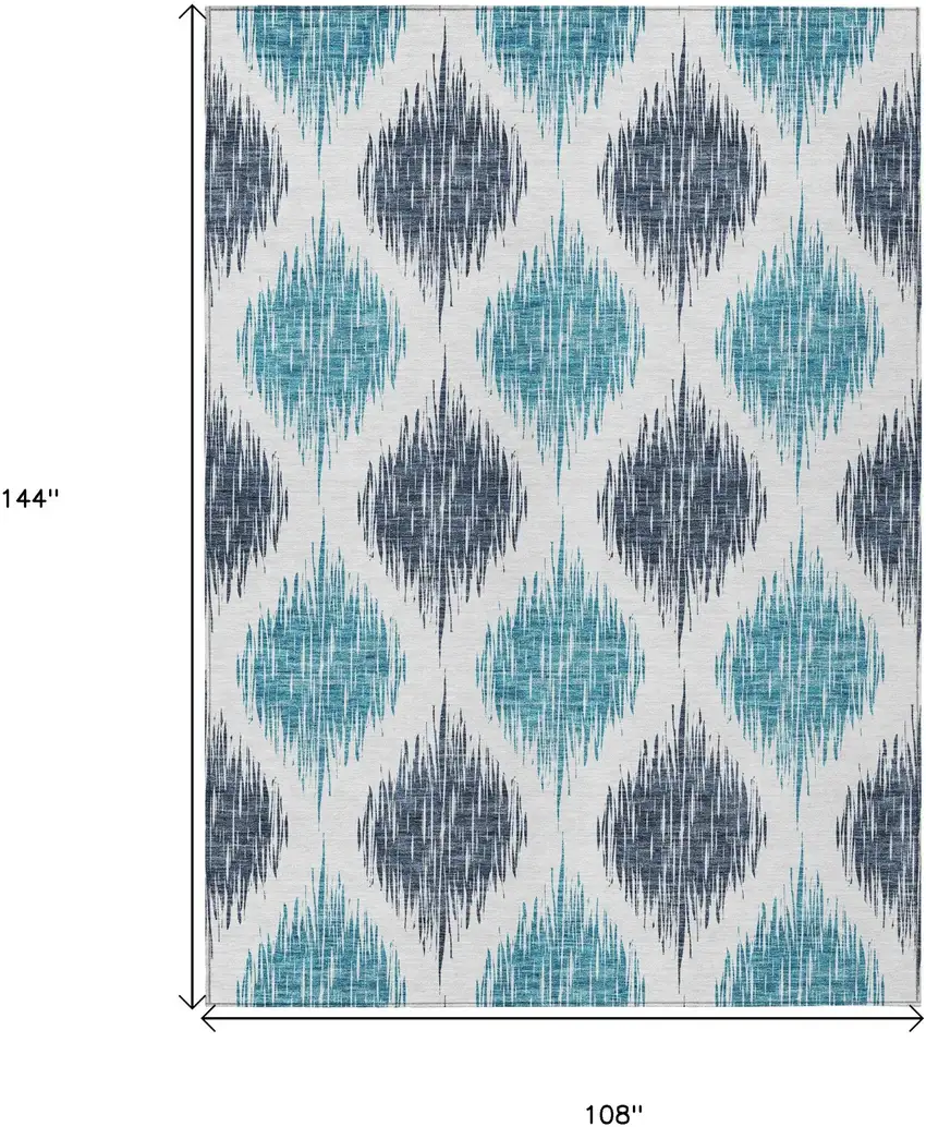 Teal Blue And Ivory Ikat Washable Indoor Outdoor Area Rug Photo 3
