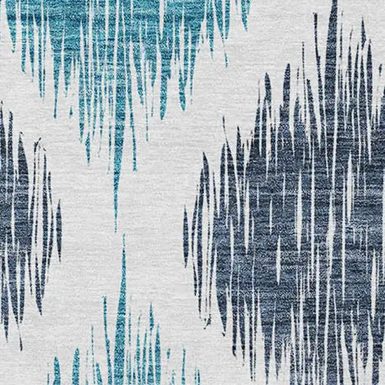 Teal Blue And Ivory Ikat Washable Indoor Outdoor Area Rug Photo 6
