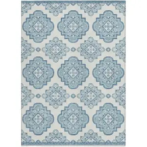 Photo of Teal Blue And Ivory Medallion Washable Indoor Outdoor Area Rug