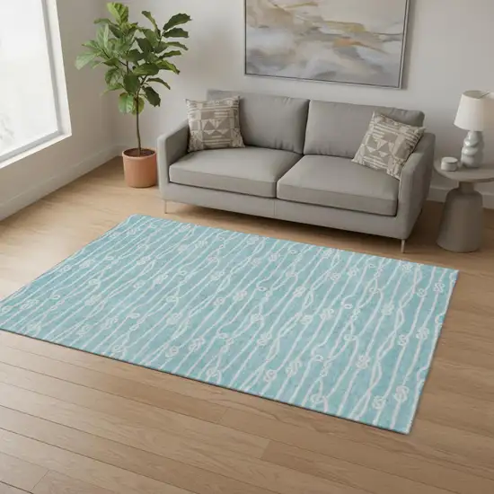 Teal Blue And Ivory Nautical Washable Area Rug With UV Protection Photo 1