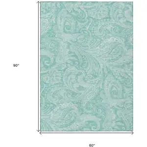 Photo of Teal Blue And Ivory Paisley Washable Indoor Outdoor Area Rug