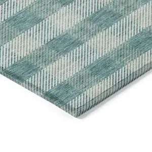 Photo of Teal Blue And Ivory Plaid Washable Indoor Outdoor Area Rug