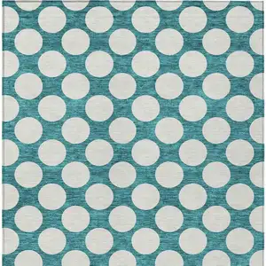 Photo of Teal Blue And Ivory Polka Dot Washable Indoor Outdoor Area Rug